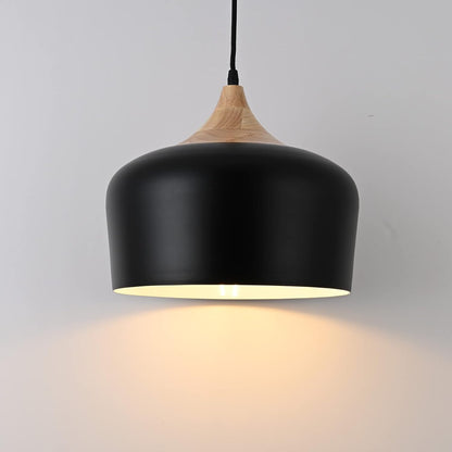 Black pendant light with wooden top on a gray background